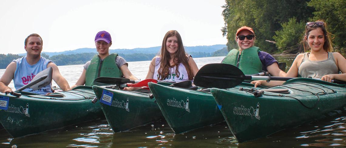 Students kayaking on the river